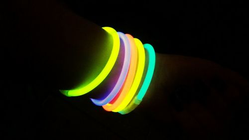 Colorful lights over black background