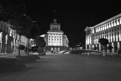 View of buildings in city at night