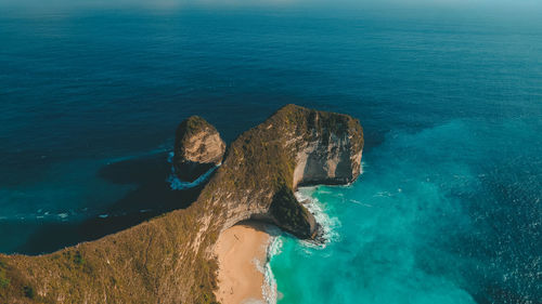 High angle view of rock formation in sea