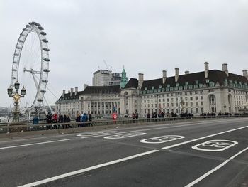 View of ferris wheel in city