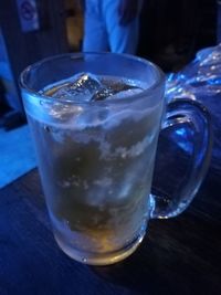 Close-up of beer in glass on table