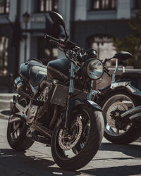 Close-up of motorcycle on street