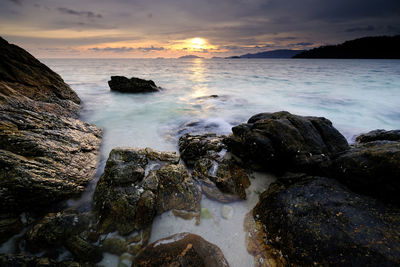 Scenic view of sea against sky during sunset