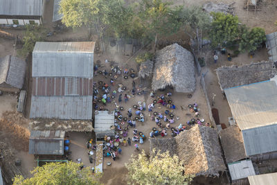 High angle view of people by building in city