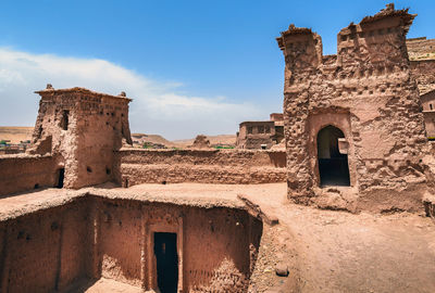 Low angle view of old ruin building against sky