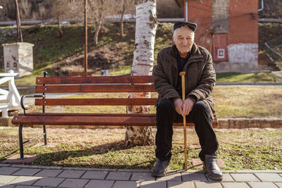 Senior man sitting on bench