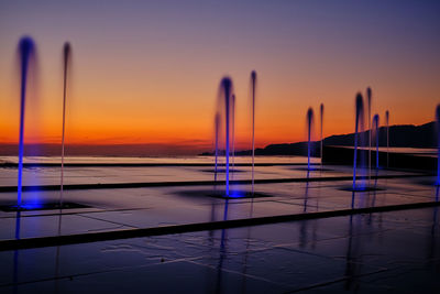 Scenic view of sea against sky at dusk