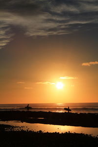 Scenic view of sunset over sea