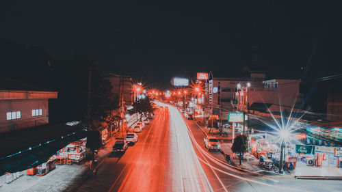 High angle view of illuminated city at night