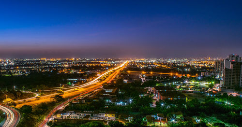 High angle view of illuminated city at night