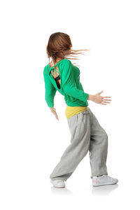Full length of girl standing against white background