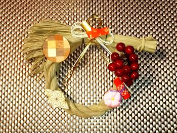 High angle view of tomatoes in basket on table