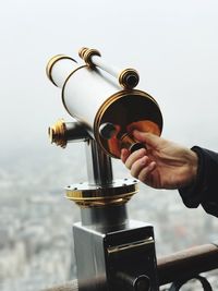 Man holding telescope