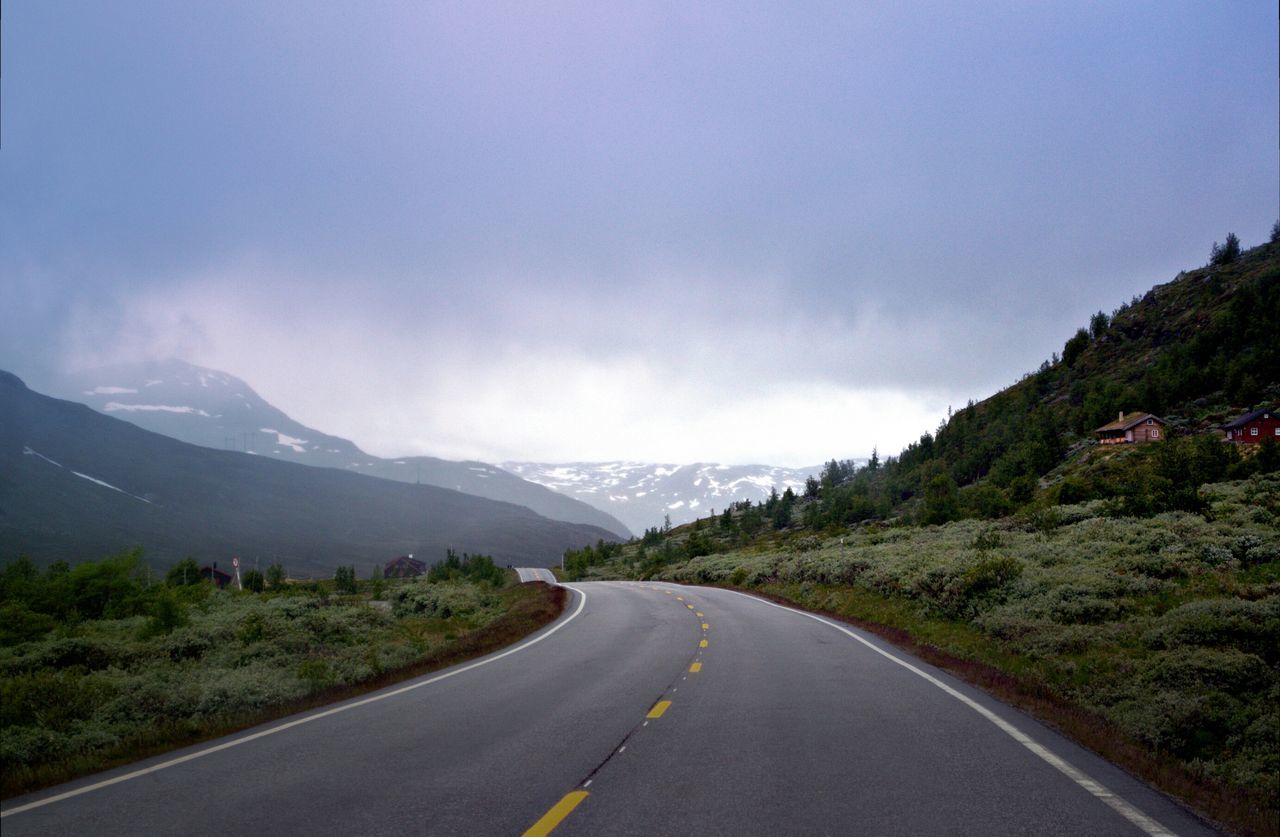 road, the way forward, mountain, transportation, road marking, country road, sky, mountain range, diminishing perspective, vanishing point, landscape, empty road, tranquil scene, scenics, tranquility, nature, beauty in nature, asphalt, non-urban scene, cloud - sky