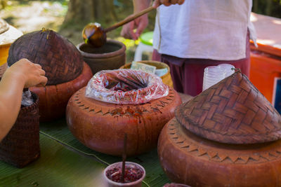 Close-up of people holding food