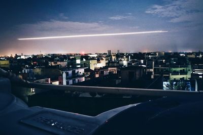 Aerial view of city against sky