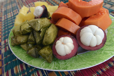 Close-up of fruits in plate