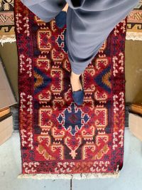 Low section of man standing on tiled floor