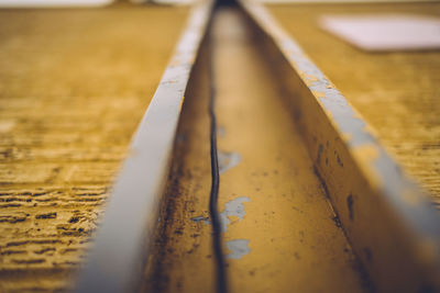 Close-up of yellow footpath