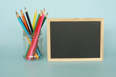 Directly above shot of multi colored pencils on table