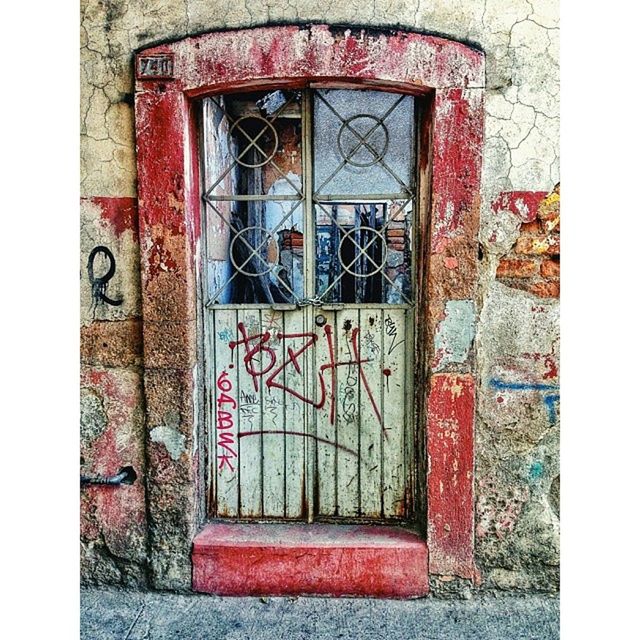 building exterior, door, built structure, architecture, closed, transfer print, window, auto post production filter, entrance, safety, protection, wall - building feature, house, security, old, red, day, outdoors, wood - material, wall