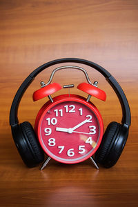 Close-up of clock on table