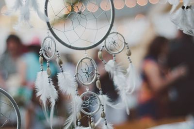 Close-up of dreamcatcher hanging during wedding ceremony