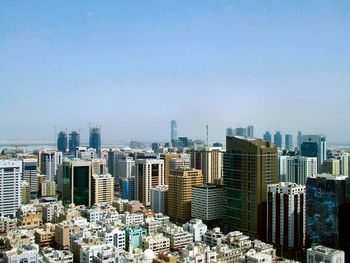 Modern buildings in city against sky