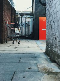 Bicycle on sidewalk by building