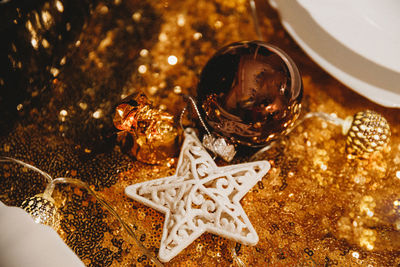 High angle view of christmas ornaments on table