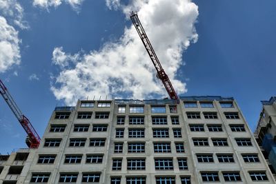 Low angle view of incomplete building against sky