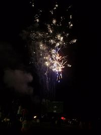 Firework display at night