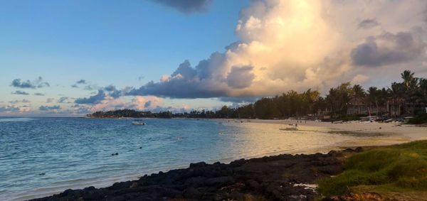 Panoramic view of sea against sky during sunset