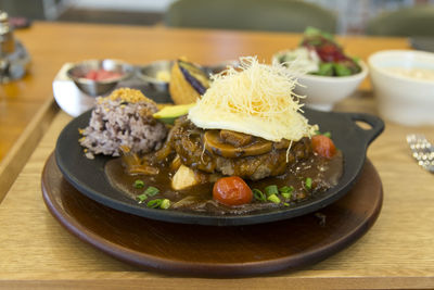 Close-up of food served on table