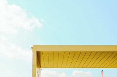 Low angle view of built structure against blue sky