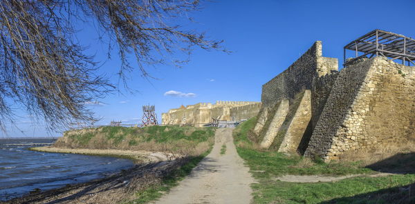 View of old building against blue sky
