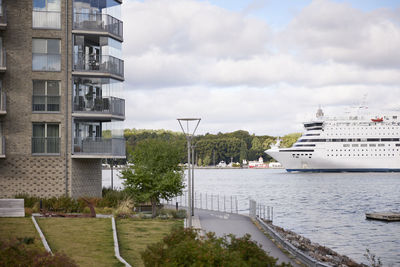 Cruise ship and residential buildings in city