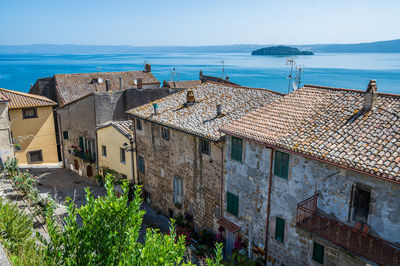 The townscape of the ancient village of marta, on the shore of the bolsena lake in italy