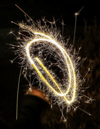 Close-up of firework display at night