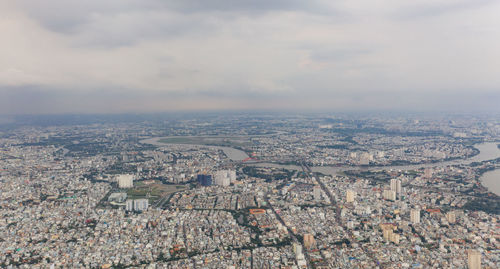 Aerial view of city against sky