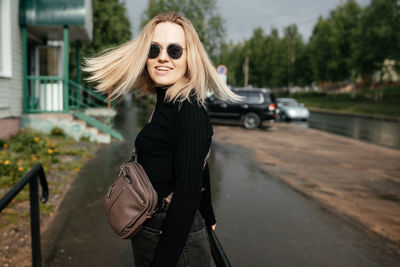 Close-up. a beautiful girl is enjoying a summer day in the city. 