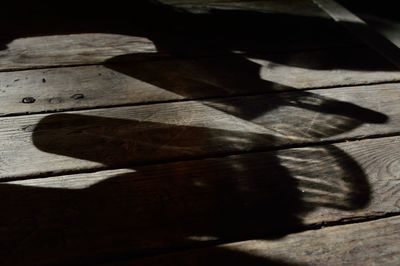Close-up of shadow on table