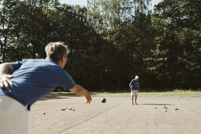 People playing pétanque