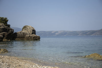 Scenic view of sea against clear sky