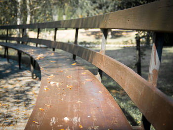 Close-up of wood against bridge