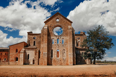 Facade of historic building against sky