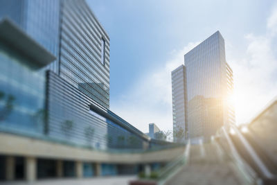 Low angle view of modern buildings against sky