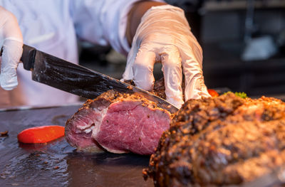 Close-up of man preparing food