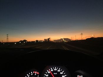 Road seen through car windshield