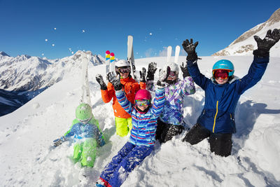 High angle view of people skiing on snow